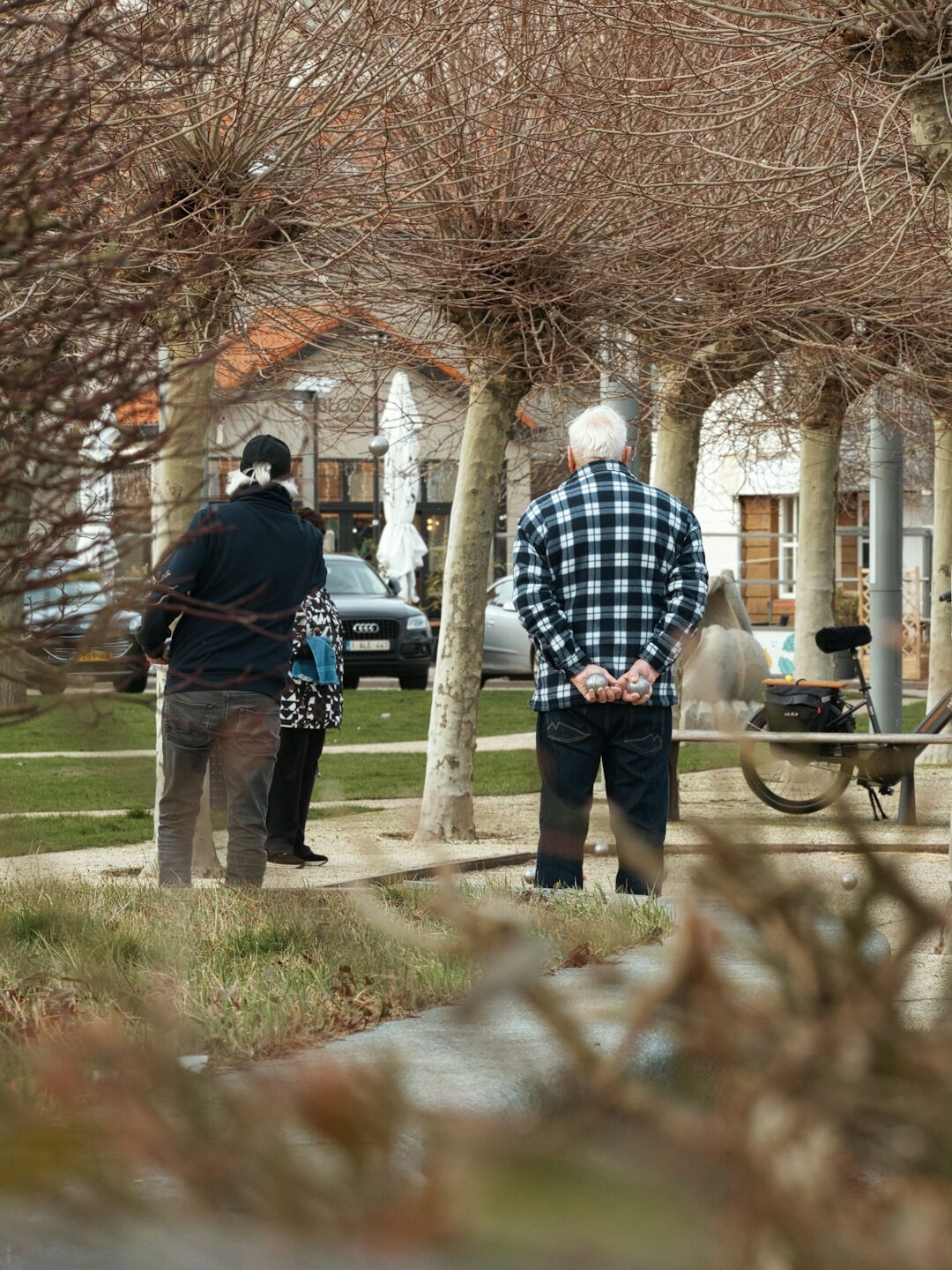 elderly group walking in park