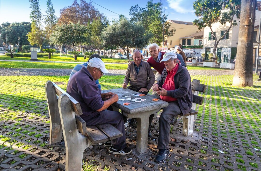 elderly group playing cards